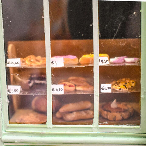 Scale of model of patisserie in Montmartre, Paris.