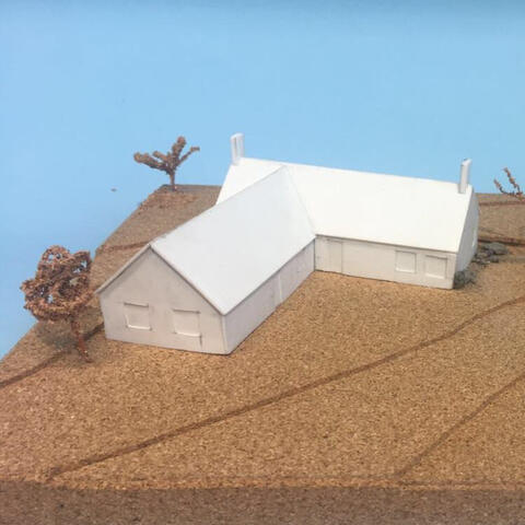 Architectural model of Scottish cottage.